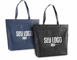 Sacola em non-woven (80 g/m²) termo-selado com alças de 55 cm. 480 x 380 x 85 mm 