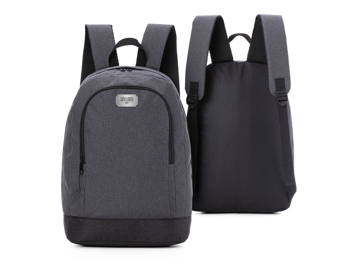 Mochila p/ Notebook em tecido poliéster.
Parte externa:
Bolsos frontal com ziper.
Bolso lateral.
Alça de ombro acolchoada.

Parte interna:
Compartimento acolchoado p/ notebook