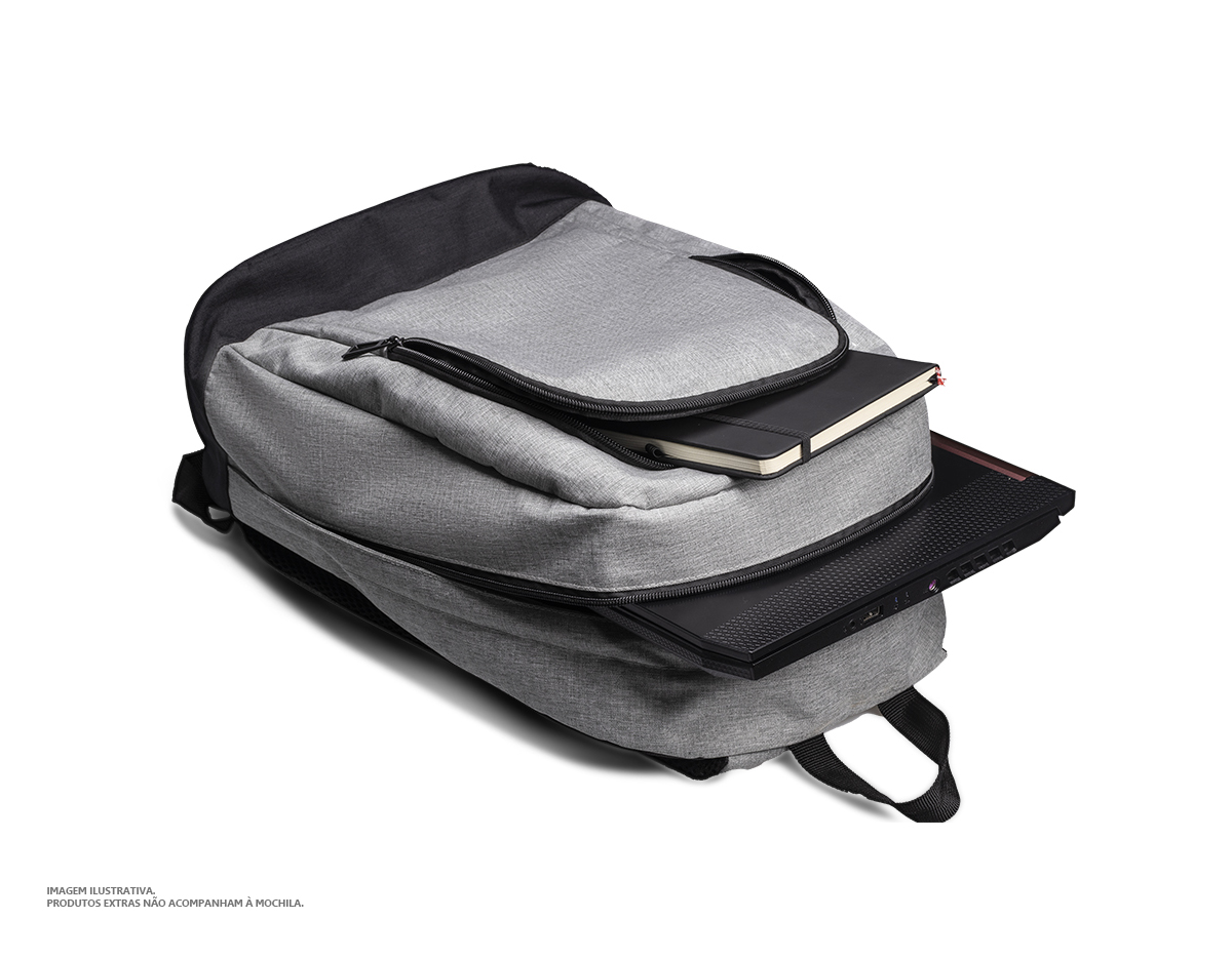 Mochila p/ Notebook em tecido poliéster.
Parte externa:
Bolsos frontal com ziper.
Bolso lateral.
Alça de ombro acolchoada.

Parte interna:
Compartimento acolchoado p/ notebook