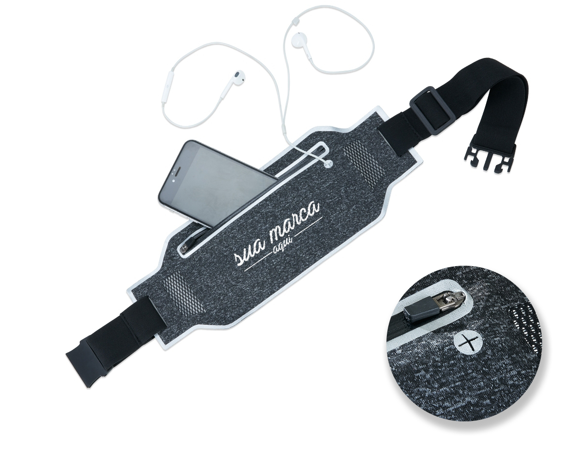 Pochete anti-furto esportiva. Confeccionada em lycra impermeável, a pochete possui um formato slim que permite a utilização por dentro da roupa sem causar volume, aumentando a possibilidade de não ter seus pertences furtados. Ideal para práticas esportivas, a pochete possui saída para fone de ouvido, cinta elástica ajustável com fivelas, saídas laterais para circulação de ar e contornos reflexivos. Contém um zíper selado que impossibilitada a infiltração de água, seu compartimento interno possui uma divisória para separação do celular e itens que possam vir à riscá-los.