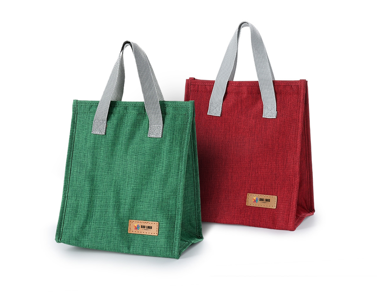 Bolsa térmica oxford com capacidade de 5 litros com fechamento em velcro. Contém alças de mãos 
