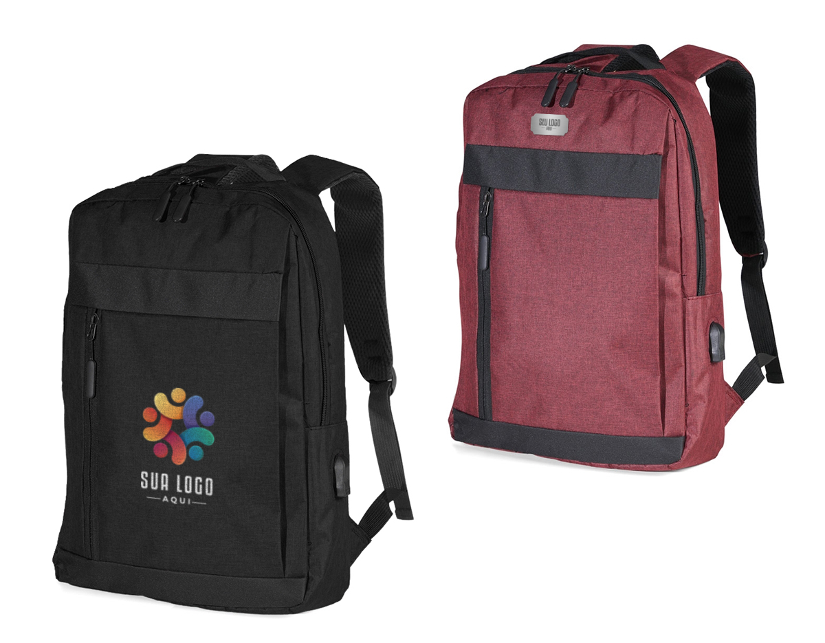 Mochila de nylon 21 litros com dois compartimentos, sendo o principal com bolso para notebook 156. Com divisórias internas para acessórios, a mochila possui bolso lateral, suporte externo usb e alça para encaixe em malas de viagem. 40x30x18