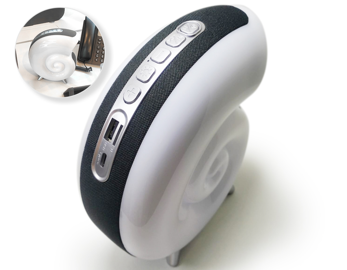 Caixa de som multimídia TWS formato concha com luminária RGB. Qualidade sonora e conectividade total: compatível com bluetooth, rádio FM, cartão TF (MicroSD) e pen drive. Iluminação relaxante e dinâmica, são 7 modos de iluminação RGB com uma vasta gama de movimentos e tonalidades. Sua tecnologia TWS permite sincronizar duas caixas de som em uma, criando uma experiência imersiva compotência excepcional. Fabricada em plástico ABS e PC, seu design exclusivo possui uma faixa de poliéster e pés antideslizantes para maior estabilidade em qualquer superfície. Acompanha cabo USB Tipo-C.