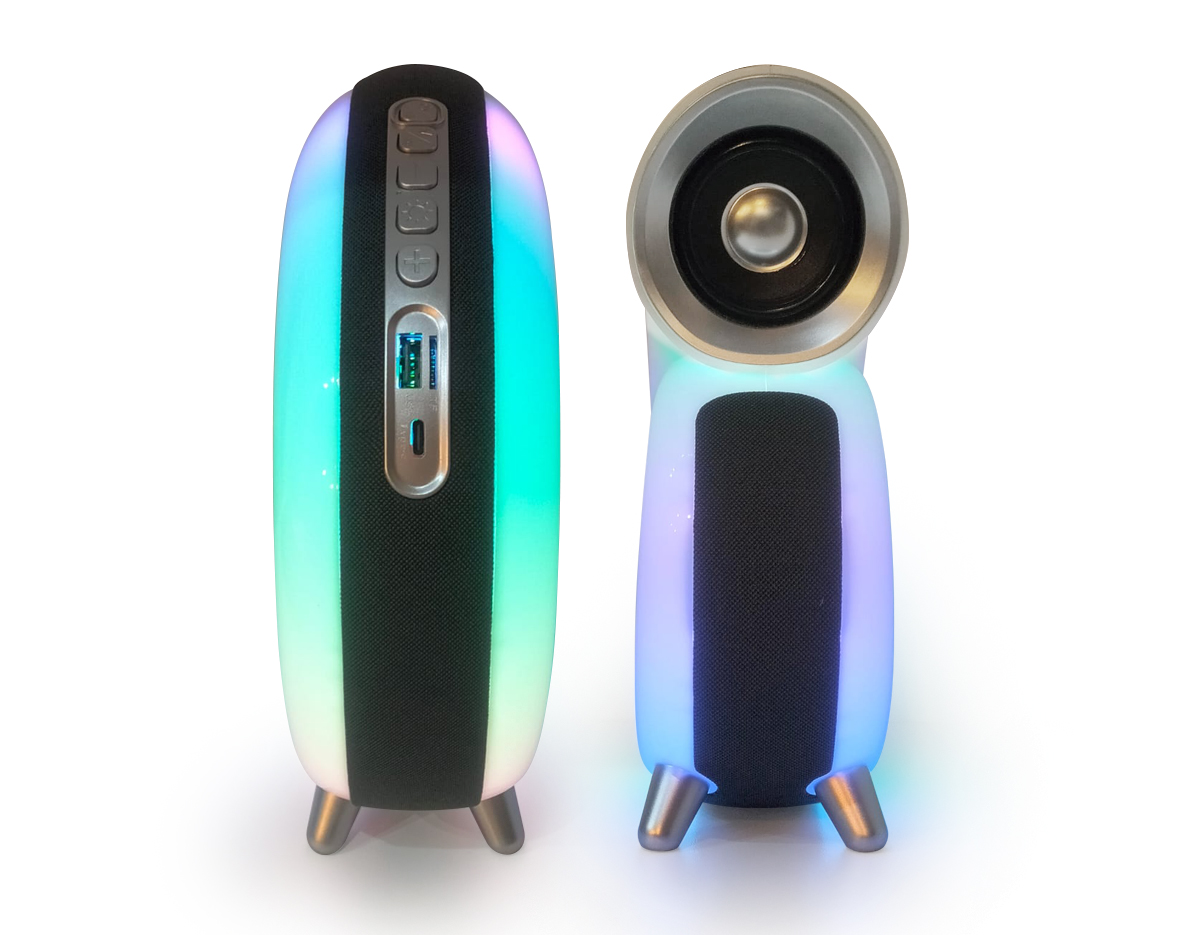 Caixa de som multimídia TWS formato concha com luminária RGB. Qualidade sonora e conectividade total: compatível com bluetooth, rádio FM, cartão TF (MicroSD) e pen drive. Iluminação relaxante e dinâmica, são 7 modos de iluminação RGB com uma vasta gama de movimentos e tonalidades. Sua tecnologia TWS permite sincronizar duas caixas de som em uma, criando uma experiência imersiva compotência excepcional. Fabricada em plástico ABS e PC, seu design exclusivo possui uma faixa de poliéster e pés antideslizantes para maior estabilidade em qualquer superfície. Acompanha cabo USB Tipo-C.