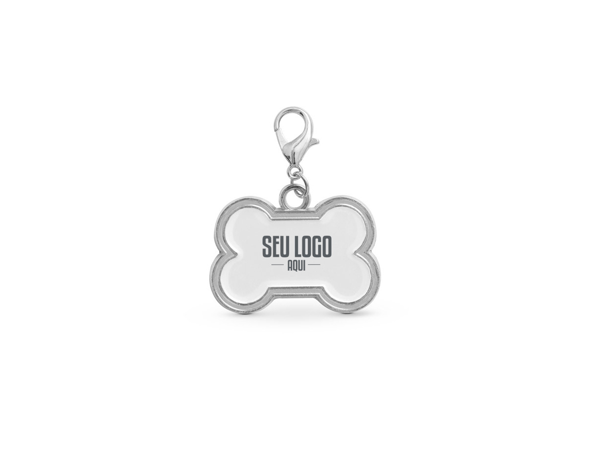 Chaveiro em formato de osso, com medidas de 32 x 22 x 2 mm. É ideal para identificar animais de estimação, oferecendo um acessório prático e funcional para personalização e fácil reconhecimento.