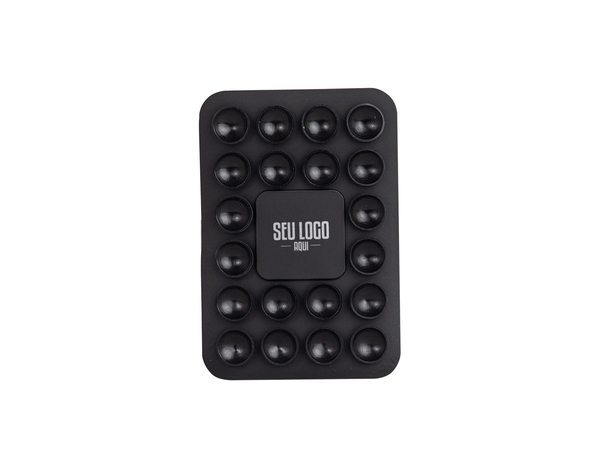 Libere o uso das mãos e utilize nossa ventosa para fixar celulares em superfícies lisas. Produzida em PVC flexível, conta com 20 ventosas que garantem a fixação dos celulares em superfícies como mesas, espelhos, janelas e até no carro, sem a necessidade de ferramentas extras. Basta remover o adesivo 3M, colá-lo no celular e fixá-lo na superfície. Além de sua praticidade, o suporte oferece um espaço exclusivo para personalização, tornando-se uma excelente opção para divulgar a marca do cliente.