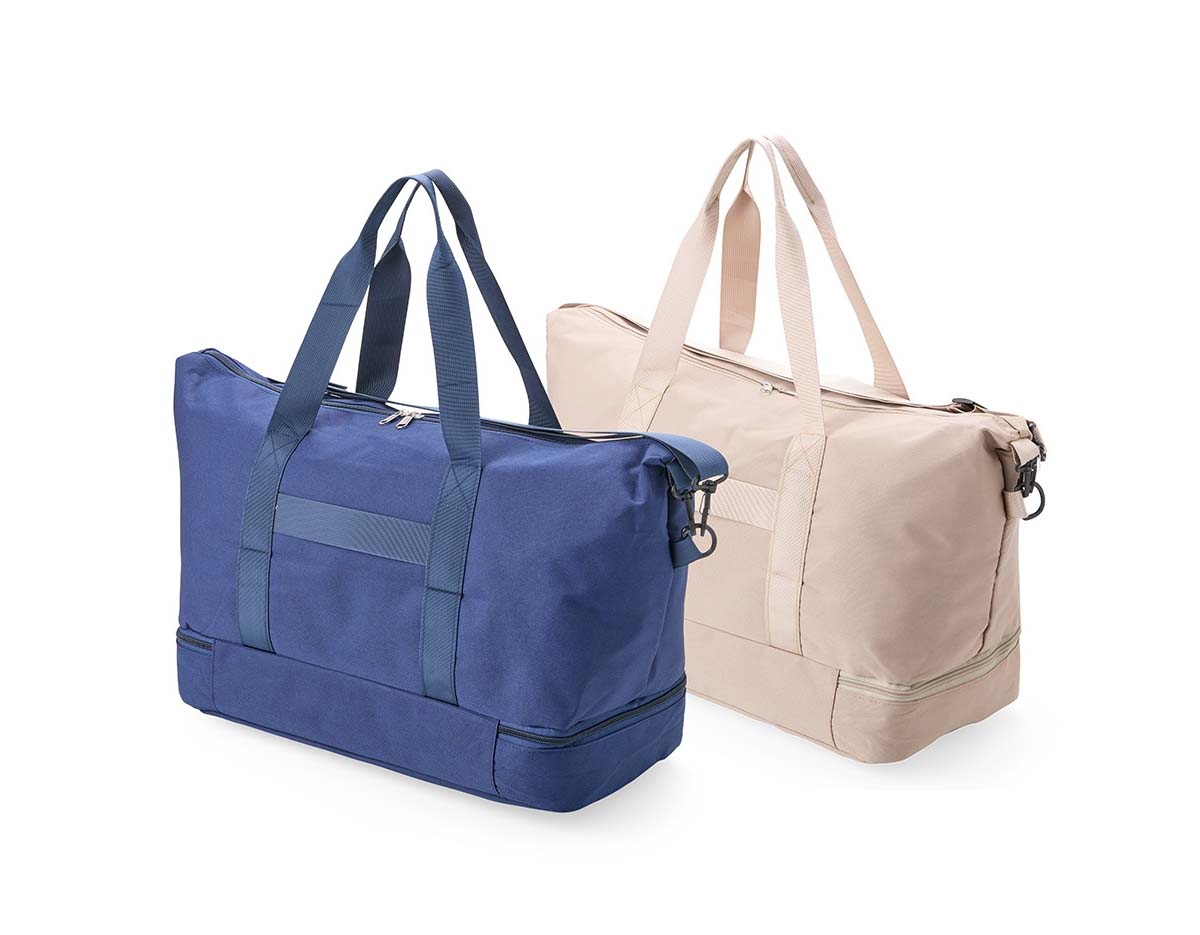 Bolsa multiuso com capacidade de até 19?L, feita em Oxford impermeável. Possui compartimento principal com dois bolsos internos, sendo um com zíper e outro dividido. Conta ainda com bolso externo para pequenos objetos e compartimento inferior com zíper. Acompanha alça transversal removível.